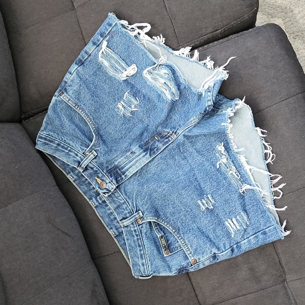 Upcycled distressed denim shorts